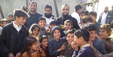 The intouch team and happy young people who were in need of food